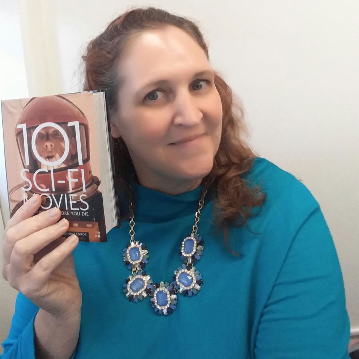 Carma, The Genre Traveler, with the book 101 Sci-Fi Movies
